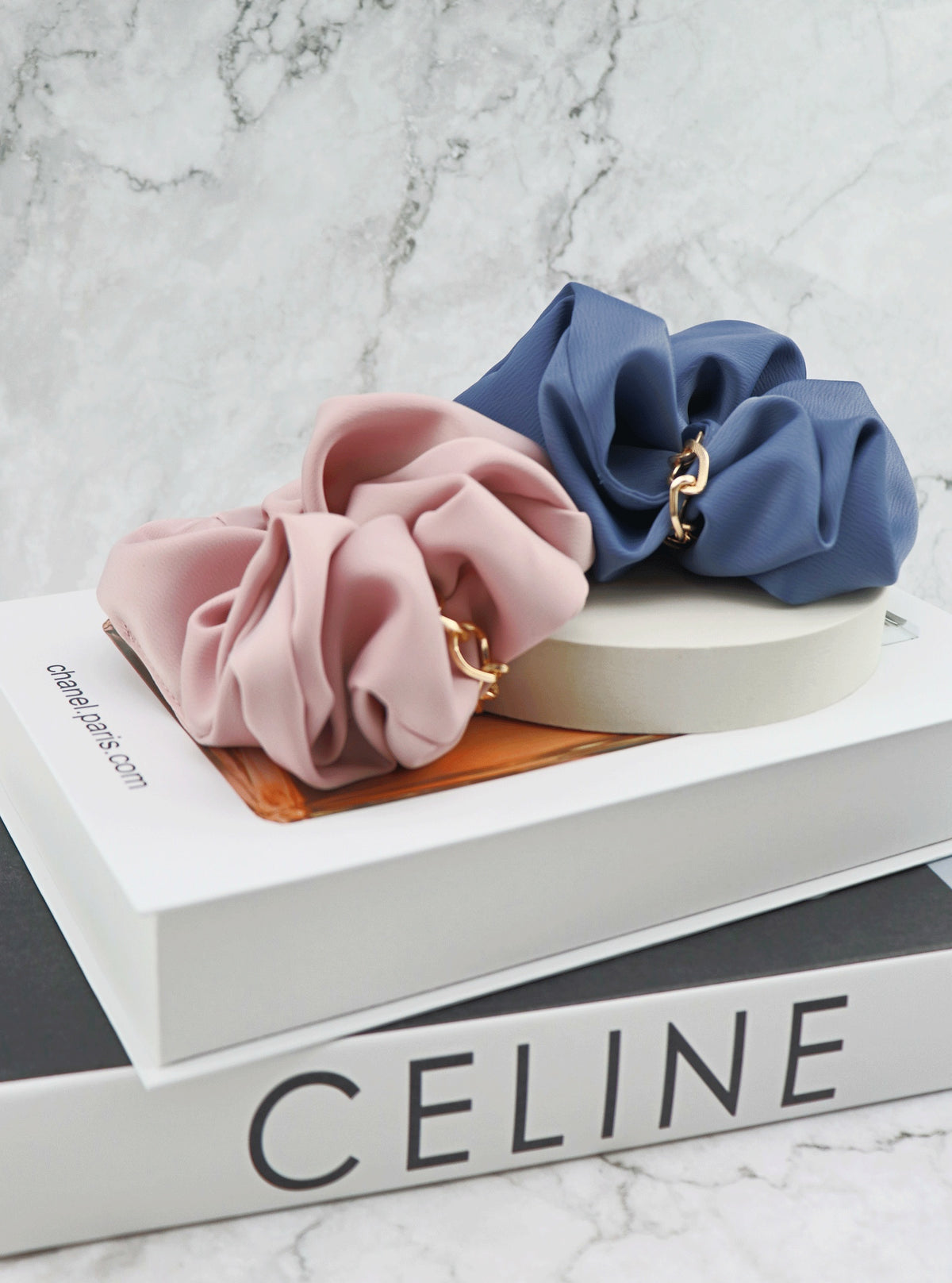 Jerika Ocean and Pink scrunchies in a styled setting