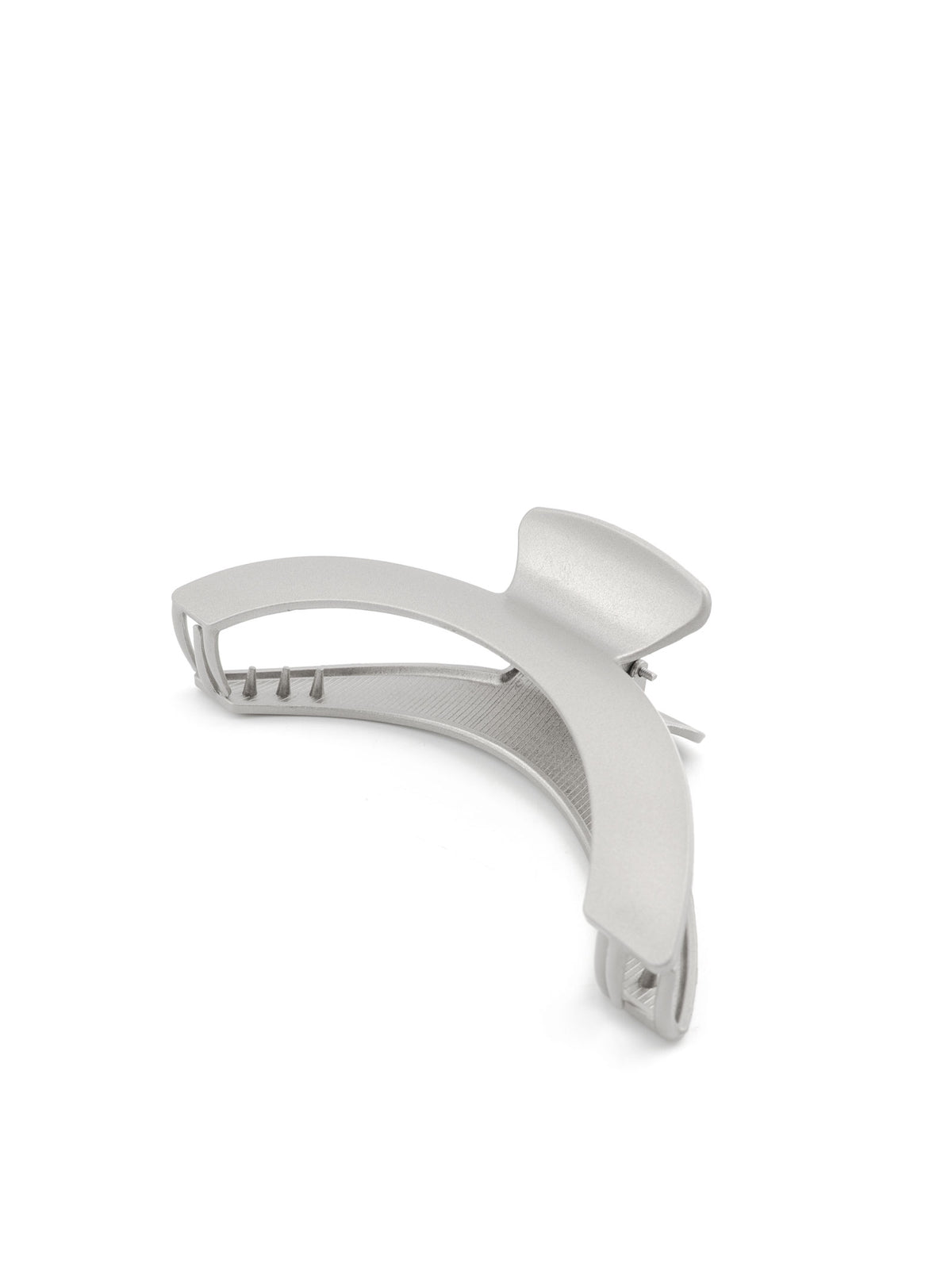 Profile view of Jila matte silver hair claw