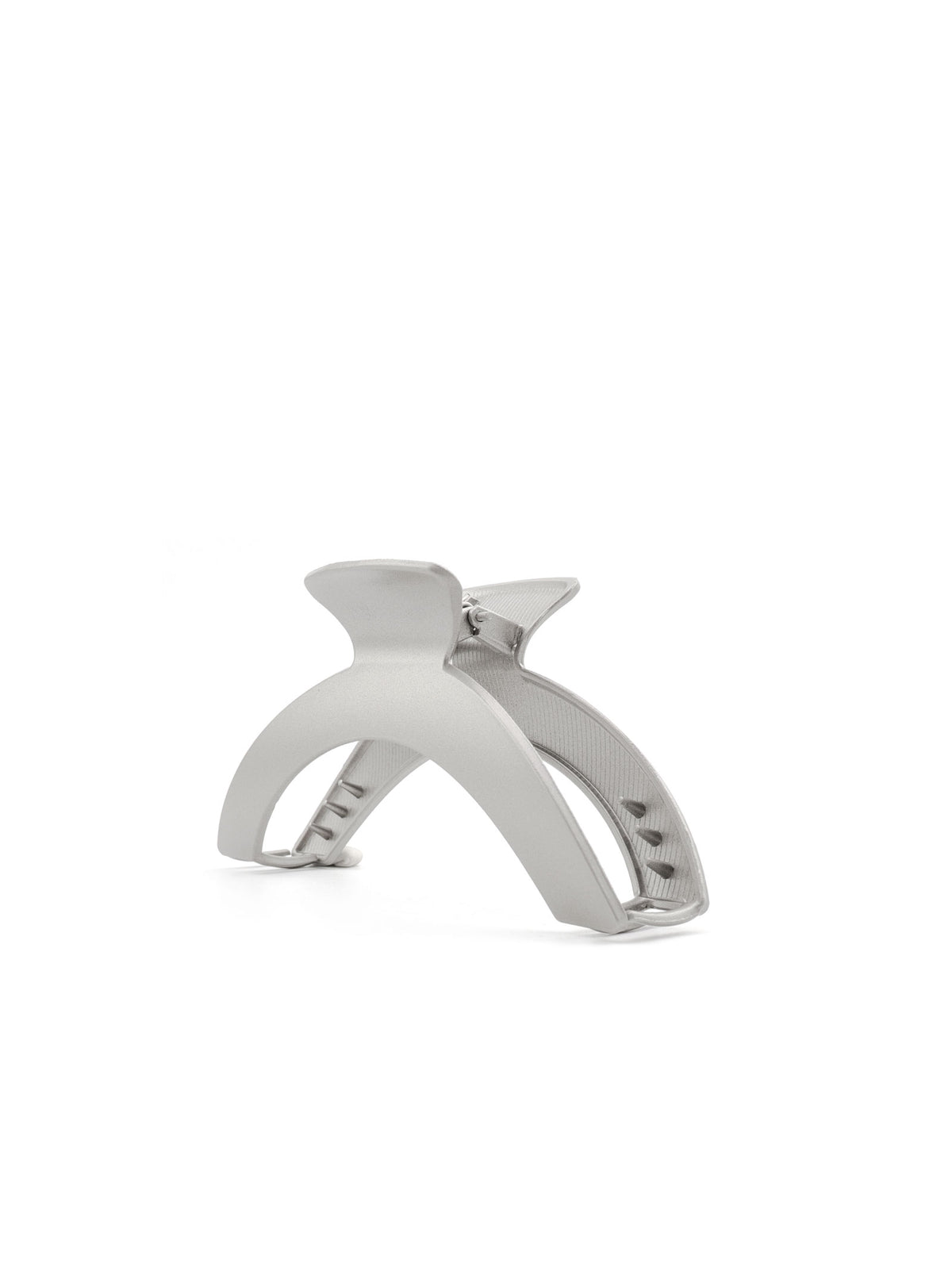 Side view of Jila matte silver sculptural hair claw