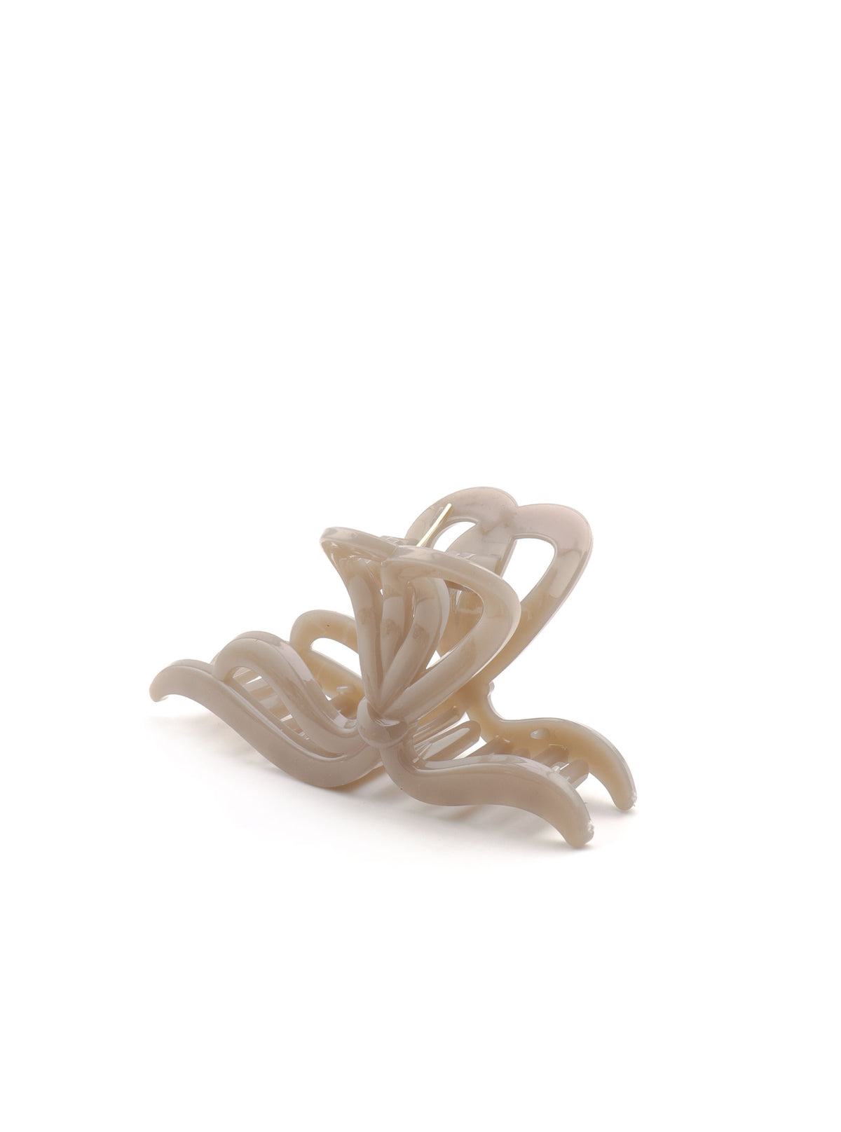 Side angle view of Jolanthe beige hair claw with open loop design