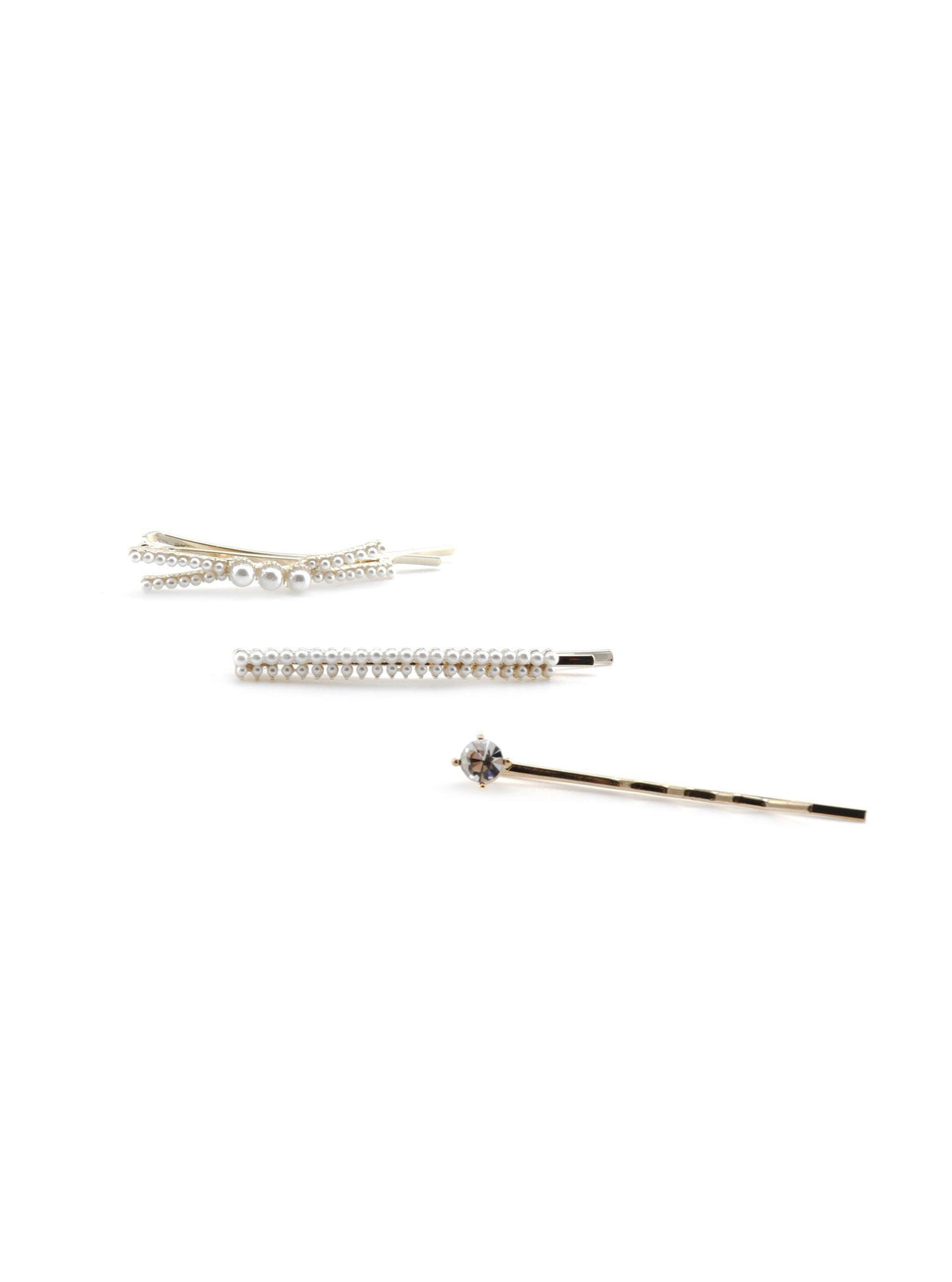 Close-up of Jaleah bobby pins with pearl and crystal details